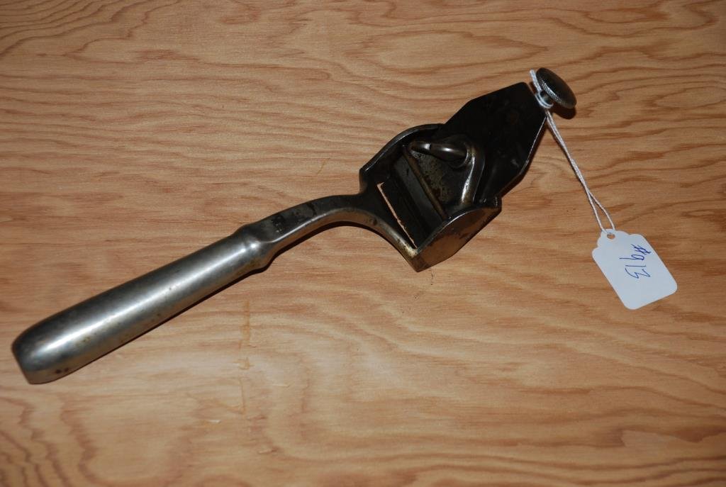 Scraper Plane: 11” long iron handled scraper plane. The #256 is cast into the metal, and there is a screw adjustment blade. Also has a nickel finish. Condition: good