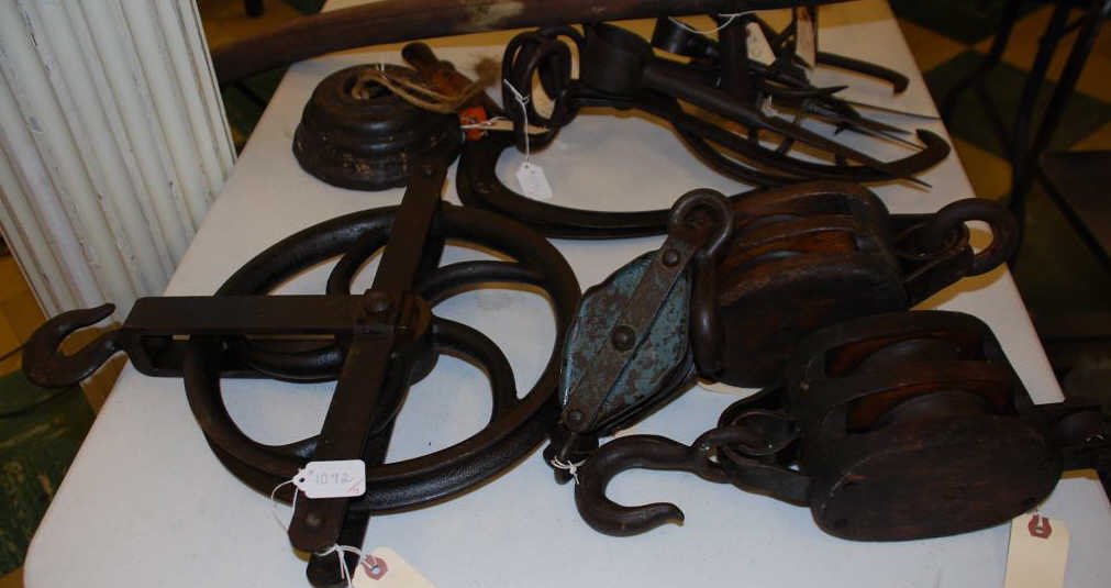 Lot of Four Pulleys: 2 metal and 2 wood.