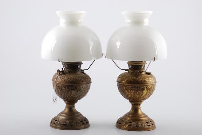 Pair of Bradley and Hubbard Brass Table Lamps: Pair of Bradley and Hubbard Brass Table Lamps with B & H and Rayo burner. Embossed and reticulated with milk glass shades. Condition: Good: Tarnish
