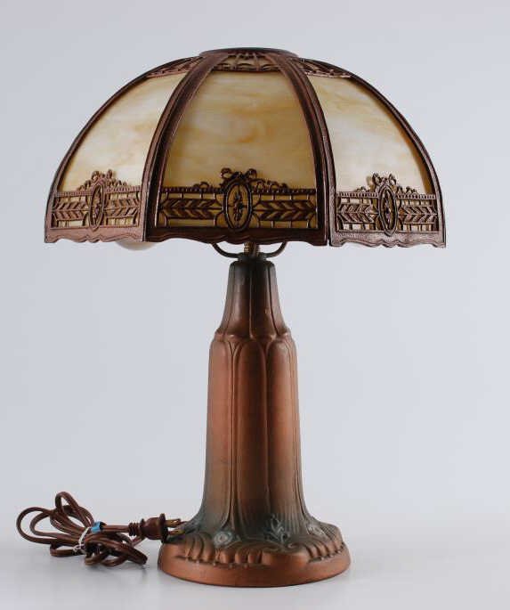 Painted Redware Table Lamp with Slag Glass Shade: Painted Redware Table Lamp with Slag Glass Shade. Height 20 inches. Shade width 15 inches. Condition: Chips to redware lamp base, paint loss to shade frame