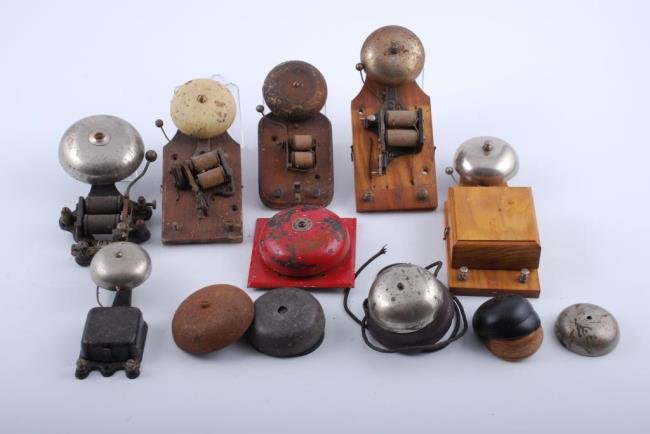 Miscellaneous Bell Lot: Collection of electric bells / phone, chimes and parts, (1) wooden door bell button with milk glass push button Condition: Fair-poor