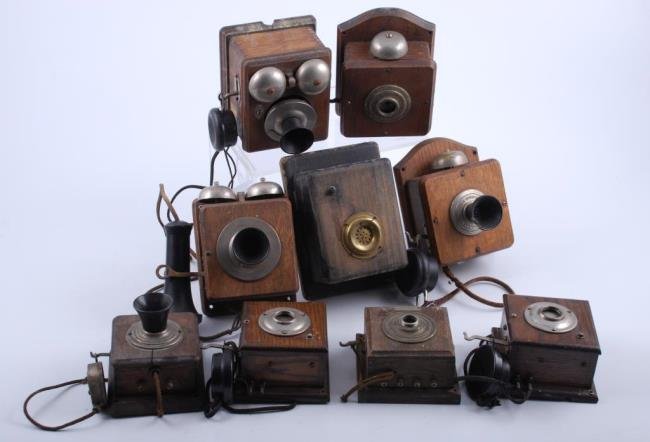 Lot of (9) Very Early Extension Phones: Manufactured by Western Electric, Couch, Duplex, Loeffler etc. Some complete and some missing parts. An assortment of wooden, brass, Bakelite etc. circa 1900-1907 Condition: Good-Fair
