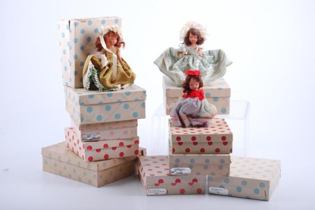 Ten Boxed Nancy Ann Story Book dolls: Includes Ireland, See Saw Majorie Daw, Little Bo Peep pretty as a picture, Tuesdays Child, Sugar and Spice, Bride, Rain Rain, etc. Condition: Boxes have light soil, tears and crushed, most dolls clean