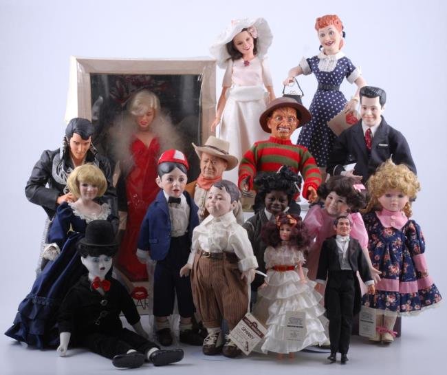 Fourteen porcelain Collector Dolls: Includs Musical Charlle, ChapLama, Princess Dianna, Hamilton Collection Lucy and Ricky 18", Talking Freddy Krueger(works), Gone with the Wind, boxed Mariln Monroe, House of Lloyd Melissa, Condition: V