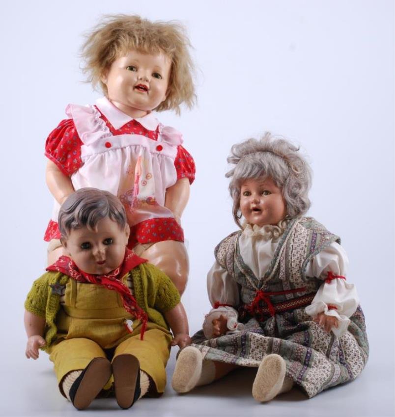 Three Vintage Dolls: Includes Effanbee Lovums (26 inch); Ax Camp boy doll (22 inch)and 26 inch composition with original clothing. Condition: Fair to good, crazing of composition.