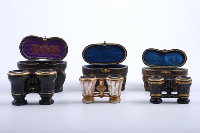 (3) 19thc. French Opera Glasses with Cases: Including a mother of pearl example by Lemieux Paris, La Reine Paris and a third Paris made for Charles W. Kennard and Co. Condition: Good, wear to cases