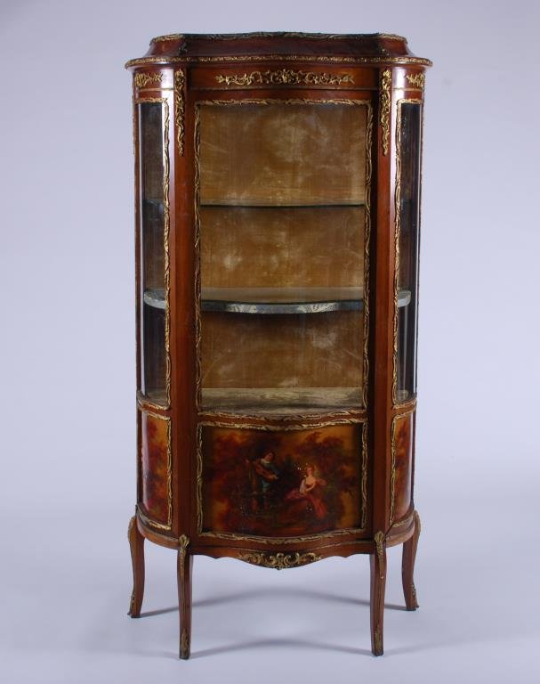 19th/20thc. French Vitrine with Painted Panels: Elaborate ogee and curved glass three shelf velvet lined etagere with brass mounts and painted triptych of a serenade. 65 x 32 x 16 inches. Condition: Flaking to painted panels. Break to glass panel.