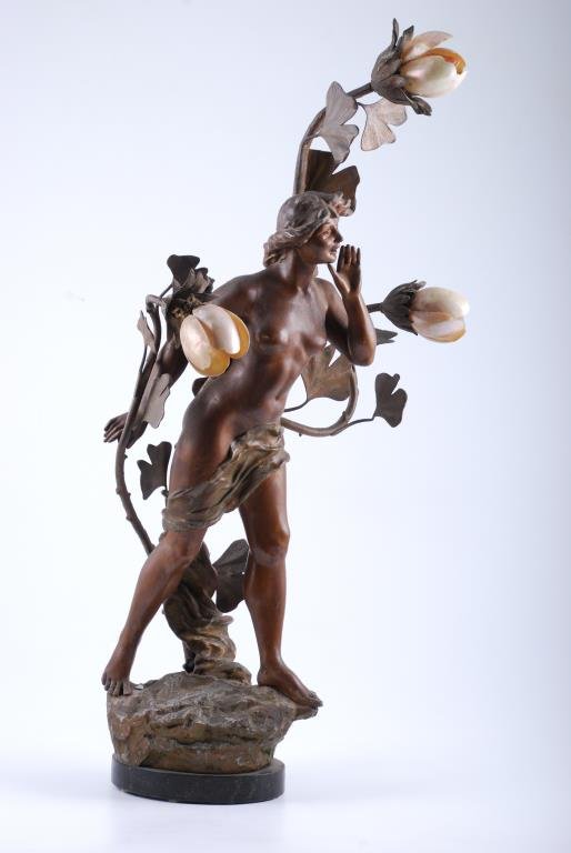 Maurice LeBlanc 19th/20thc. Cast Figural Lamp: Figural zinc alloy lamp fitted for three lights with abalone shades. Signed M. LeBlanc in casting. 36 inches height including marble base. Condition: Oxidization to surface. Lamp function untested. Br