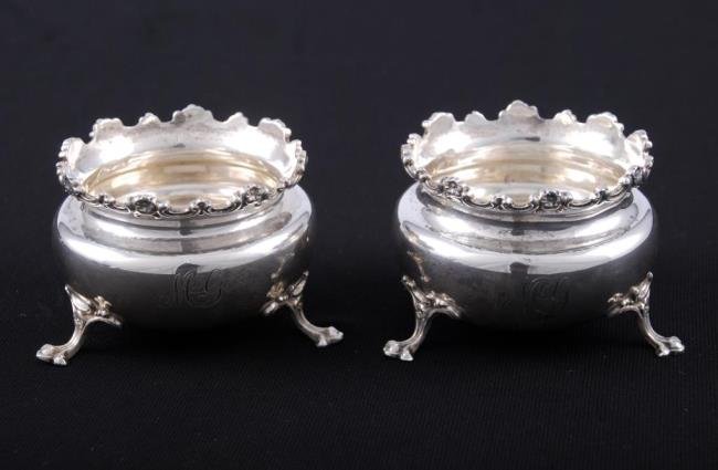 Pair Frank Smith Sterling Salts: Pair of sterling silver salts by "Frank Smith" mono MG Condition: Good Size: Approx. 1 5 /8 inches tall, weight is approx. 3.4 troy oz.