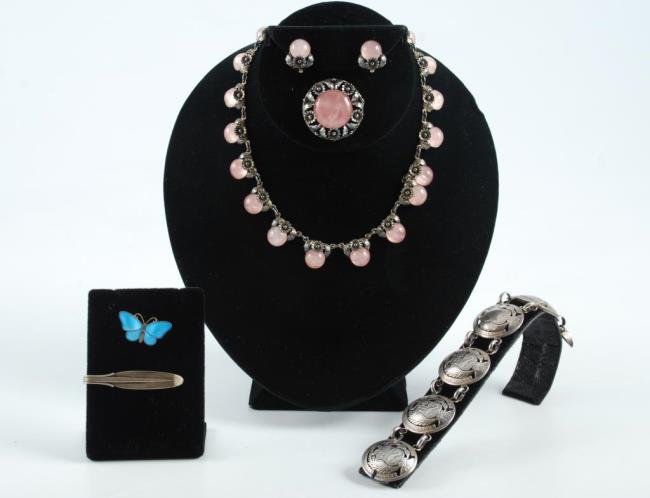 Group Danish Jewelry Jensen & N E From: A matching set by N.E. From of sterling silver with rose quartz including necklace, pin, clip earrings, Georg Jensen tie bar, David Anderson butterfly, cut coin bracelet Condition: Good Size: Necklace