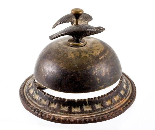 CIVIL WAR ERA DESK BELL WITH EAGLE FINIAL: Nickel plated brass eagle with iron base. Patented 1856 and 1863. 3 1/2 inches diameter.
