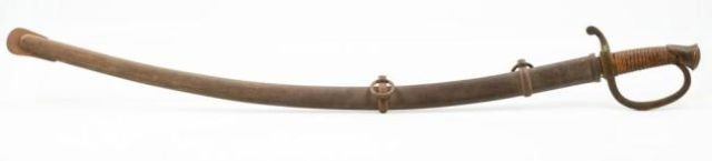 AMES MANUFACTURING ARTILLERY SABER MODEL 1840: Dated US 1864. Saber has a flat, brass handle, brown leather grip wrapped once wrapped brass wire, and steel scabbard. Its slightly shorter but more steeply curved blade and single brass knuckle-bow L