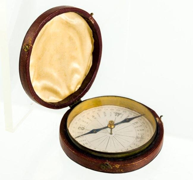POCKET DRY COMPASS IN LEATHER CASE: Unsigned. Diameter 3 inches