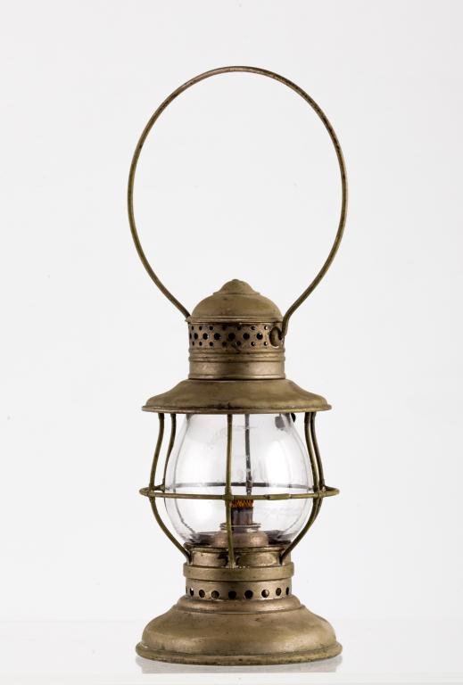 ADAMS AND ESTES FIREMAN'S LANTERN: Nickel plated lantern with swing handle, globe cage, hinged pierced lid and cupped base. Font unscrews from base stamped "Adams and Estes". Globe acid etched "L.G. Ives" Height 15 inches (to top of fu