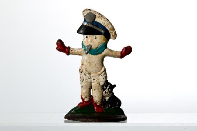 BABY CROSSING GUARD WITH PUPPY CAST IRON DOORSTOP: Height 10 1/2 inches