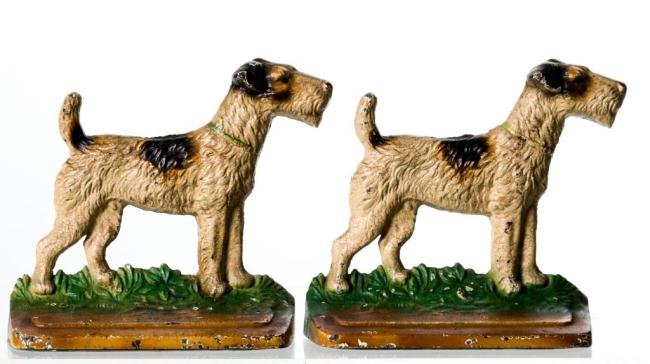 (2) TERRIER CAST IRON DOORSTOPS: Height 5 1/4 inches