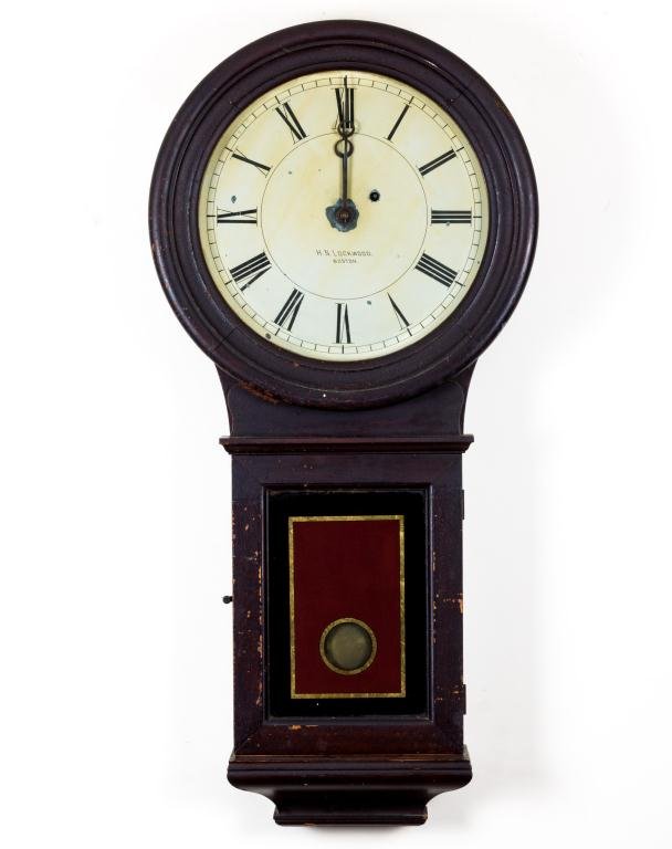 EASTMAN REGULATOR CHELSEA CLOCK CO HANGING CLOCK: Housed in an oak case, the dial is signed ""H.N. Lockwood Boston"". Unsigned movement. Calibrating instructions signed Chelsea Clock Co. Boston behind door is identical to signed Chelsea Clock in lot 