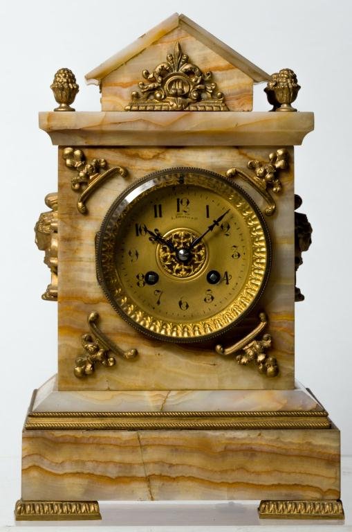 ONYX SHELF CLOCK WITH ORMOLU MOUNTS: Chiming shelf clock made for A. Stodwell & Co. Height 12 inches