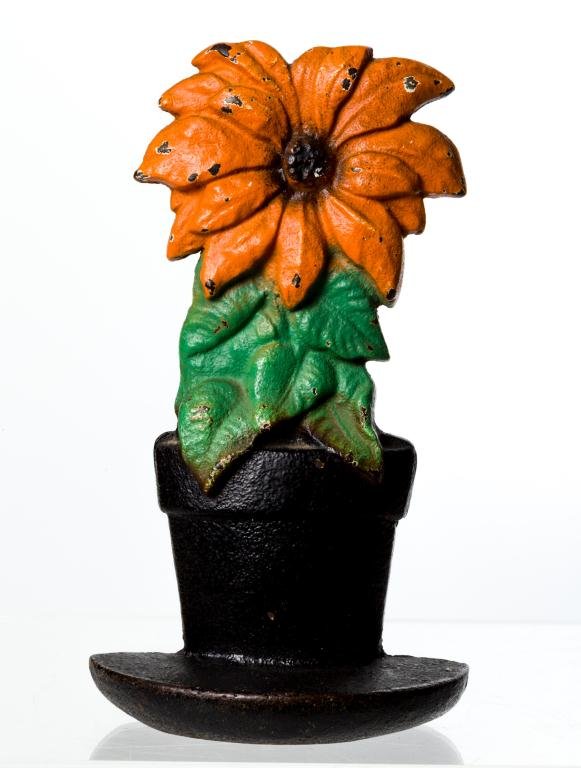 ORANGE FLOWER IN A VASE CAST IRON DOORSTOP: Height 8 1/2 inches