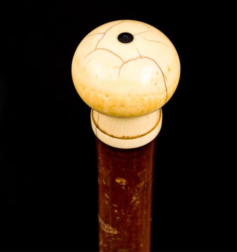 HEAVY MAHOGANY CANE W/ TURNED KNOB HANDLE: Sailor made 2 inch turned knob handle. Length 33 3/4 inches
