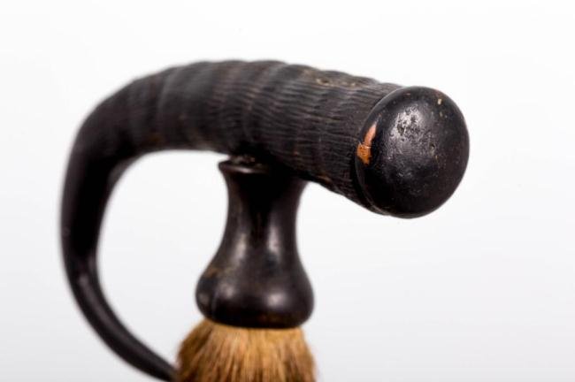 HOOF AND ANTLER TREKKING STICK WITH IRON FERRULE: Swiss or Northern Italy trekking stick with natural shaft terminated by a spiked iron ferrule. Length 36 1/2 inches
