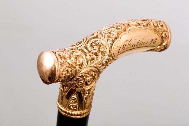 EBONY CANE WITH GOLD OPERA FORM HANDLE "FATHER": Fine 4 inch rolled gold plate ""Polo"" headed handle, ebony shaft and nickel ferrule with iron tip.. Length 37 inches