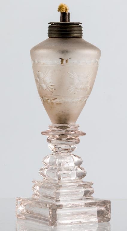 CUT AND FROSTED WHALE OIL LAMP: Free-blown acid etched cut lamp with rings of beads and floral motifs. Ringed collar typical of New England Glass Company. Large shaped wafer connects square pressed base. Height 9 inches