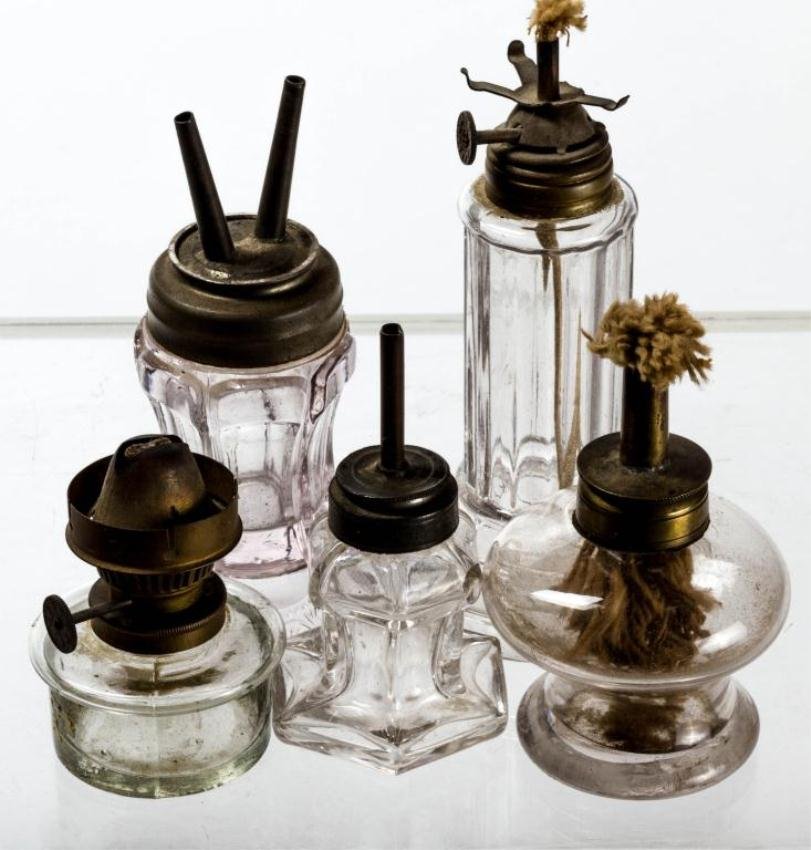 (5) MINIATURE FLUID LAMPS & TIME LAMP: Including: (1) Blown molded adapted from a door knob mold, (1) six sided blown molded example, (1) blown molded glass six paneled with embossed base (1) ""Grand Vals Perfect Time Indicator ""Time & Li