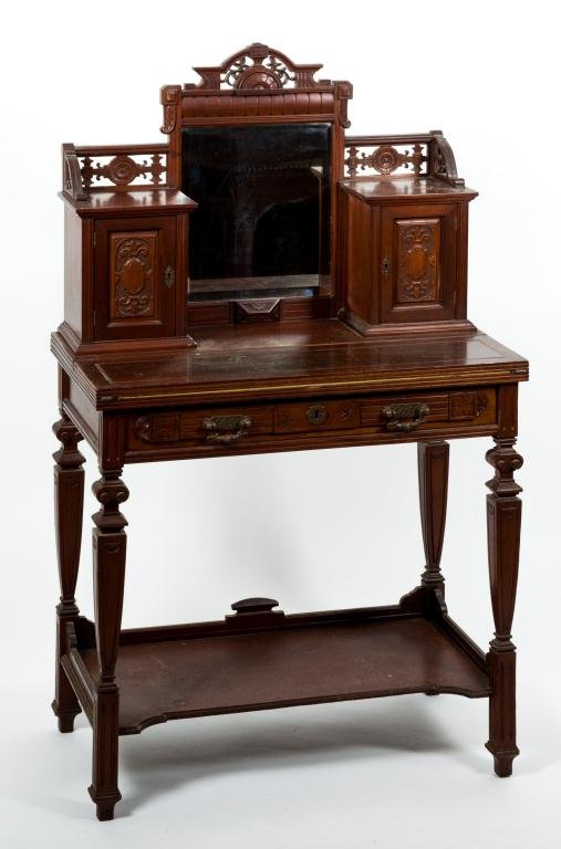 AESTHETIC MOVEMENT VICTORIAN LADY'S SECRETARY: Diminutive mahogany secretary with a carved and pierced mirror flanked by (2) locking cabinets with matching carved and pierced galleries, long drawer, carved legs and lower tray shelf. 56 x 29 x 17