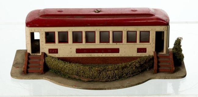 EARLY 20th c. TIN MODEL OF A DINER FOR A TRAIN SET: Length 10 1/2 inches