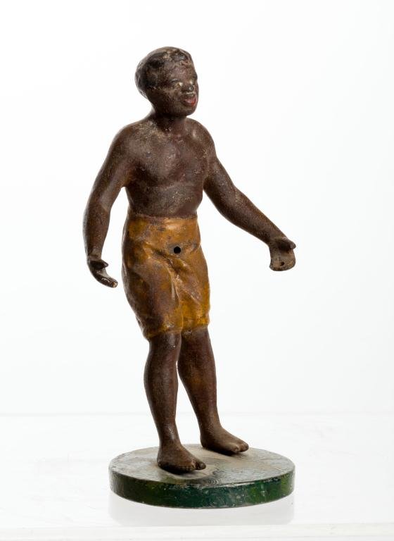BLACK AMERICANA CAST IRON PAINTED FIGURE: Fine quality hand painted cast iron figure on circular lead base. Height 9 1/2 inches