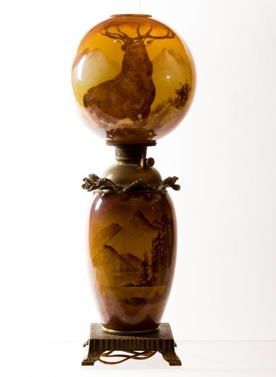 WONDERFUL AND RARE GONE WITH THE WIND F.G. COMPANY LAMP: Stag in a landscape decorated milk glass globe and base with brown and yellow background. 10 1/2 inch globe. Height 28 1/2 inches to top of globe