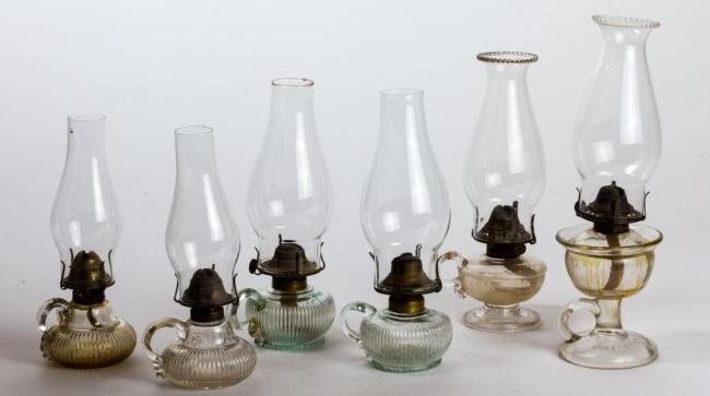 (6) SMALL FINGER AND PEDESTAL FINGER LAMPS: Including (2) similar light clear aqua blown molded ribbed finger lamps with applied handles, (2) similar clear blown molded ribbed finger lamps with applied hands and (2) pedestal finger lamps (1) pa