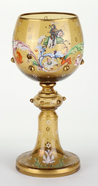 Theresienthal Enameled Amber Glass Armorial Roemer: Floral and scroll motif with jousting knight and gold highlights. Height 12 1/2 inches. Condition: Good