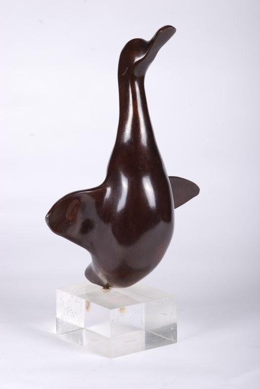 (Mid 20th c.) Bronze Duck Signed R. Andlan: "Duck Coming In" bronze. height 13 1/2 inches (not including lucite base). signed R. Andlan and E. Godard foundry. Condition: Good, minor wear/ abrasions