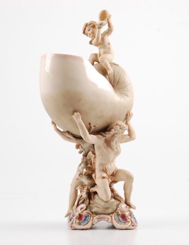 Royal Worcester Nautilus Vase: Nautilus shell font surmounted by cherub and supported by classical male and female figures. height 15 inches. signed. Condition: Good