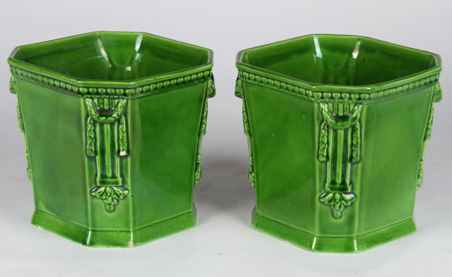 Pair of Bassano Italian Ceramic Flower Pots: Clipped cornered ceramic pots with ropes of laurel and pilasters. Height 6 1/4 inches. Condition: (1) Pot with rim chip together with other very minute minor chips to both