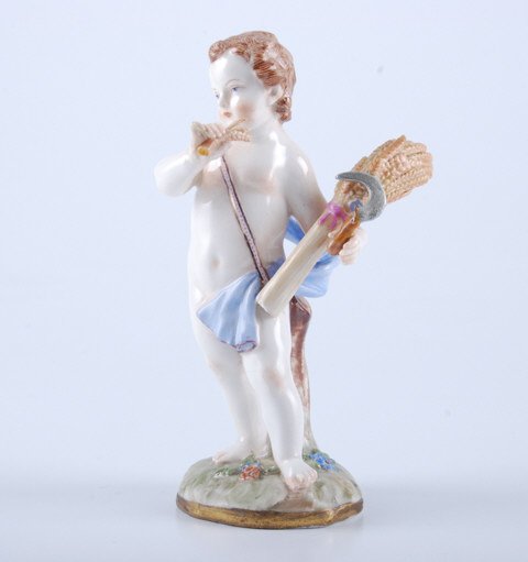 (Late 19th c.) Meissen Cupid with Sheaf of Wheat: Circa 1870. Inscribed A 67 100. height 5 1/4 inches. Condition: Small chip to handle of sickle.