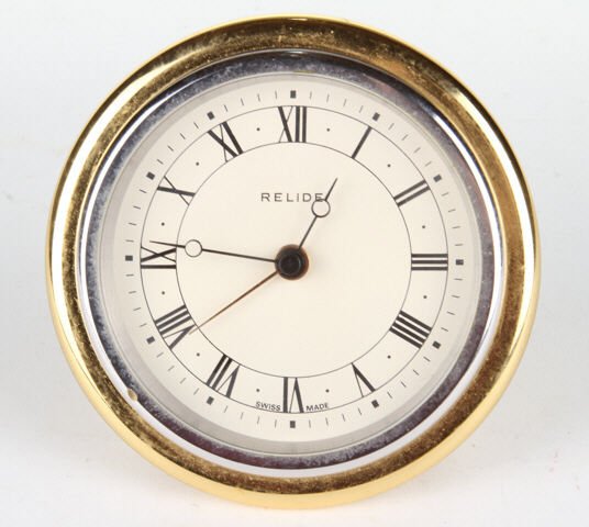 Relide Swiss Made Travel Clock: 4 inches diameter. Condition: Good (no clocks are guaranteed to work)