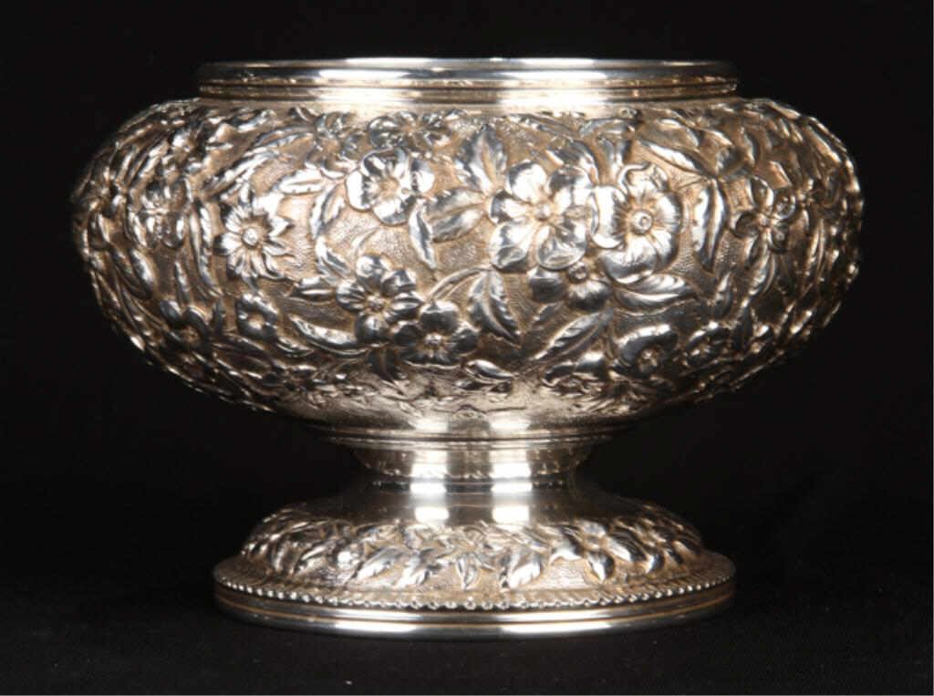 S. Kirk and Son Sterling Silver Repousse Bowl: Hand chased footed bowl with floral motif. Height 5 inches. (approximately 12.9 troy ounces) Condition: Good