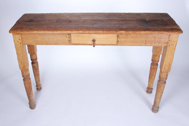 Rustic Hard Pine Console Table with Center Drawer: Early milled and turned woods readapted into its current form. 31 x 48 x 15 inches. Condition: Good