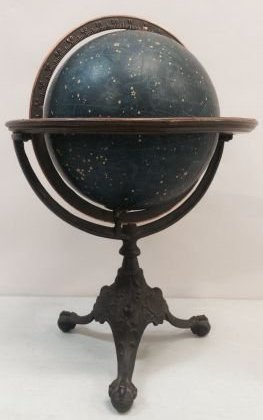 1930 Rand McNally 8 in Celestial Globe & Star Finder: Cast iron globe themed three footed stand. Height 17 inches.