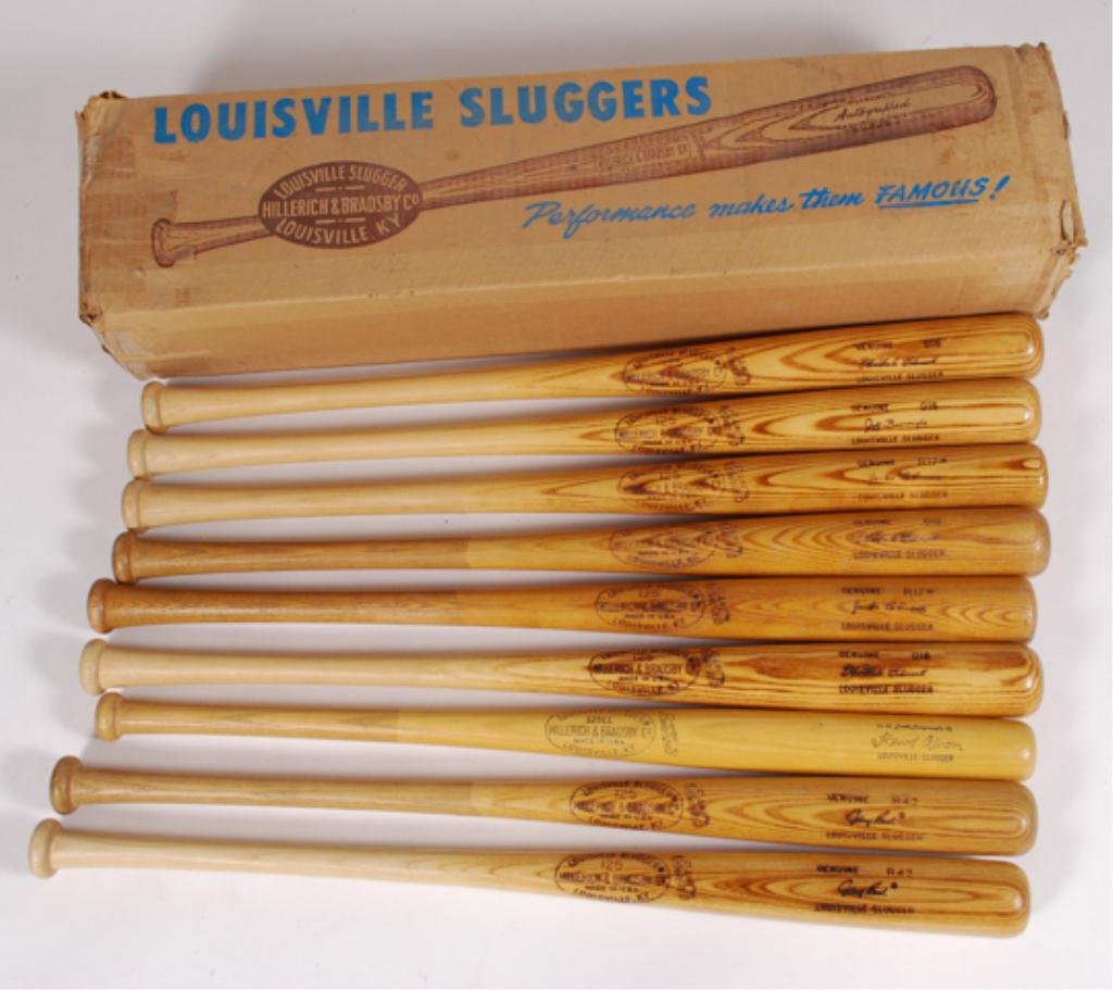 (9) Vintage Louisville Slugger Baseball Bats: As new together with their original box 36 x 9 x 7 inches. Condition: As new