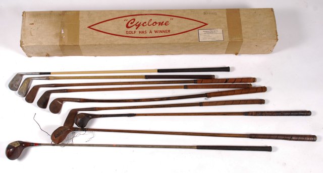 Assembled Set of Vintage Golf Clubs: Including makers such as: Ditson, R.B. Wilson St. Andrews "Special", Toledo. etc. In a vintage "Cyclone" golf club corrugated box. Condition: Good-fair