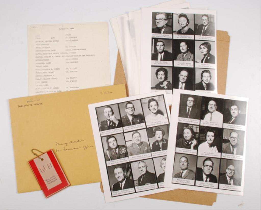 1961 John F. Kennedy's White House Staff: January 20, 1961 list of White House Staff. Together with (7) 8 x 10 staff photograph composites arranged alphabetically and Mary Durkins' White House Washington identification tag. *Note: Mary Durkin