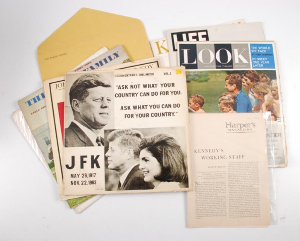 John F. Kennedy In Memoriam Magazines and Records: Including: "Documentaries Unlimited J.F.K. The Man The President" 33 1/3 RPM. (cover and jacket worn and stained, record in very good condition), "John F. Kennedy A. Memorial Album" 33 1/3 RPM by Radi