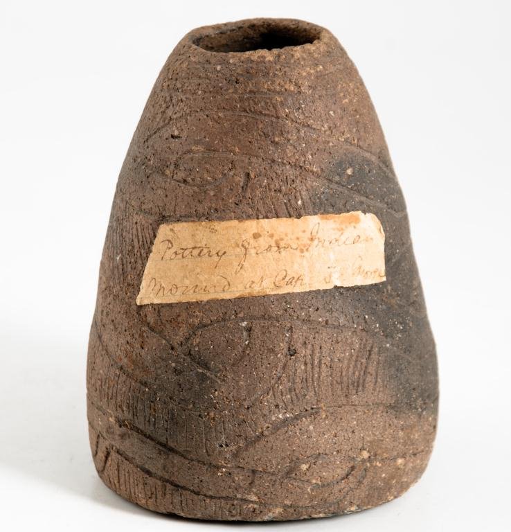 Indian Stoneware Vessel: Canadian stoneware with sgraffito decorations. Attached note stating that pottery was from an Indian mound Cape George. Once purchased in 1940 from the "early" Chamberlain family homestead. height 5 i