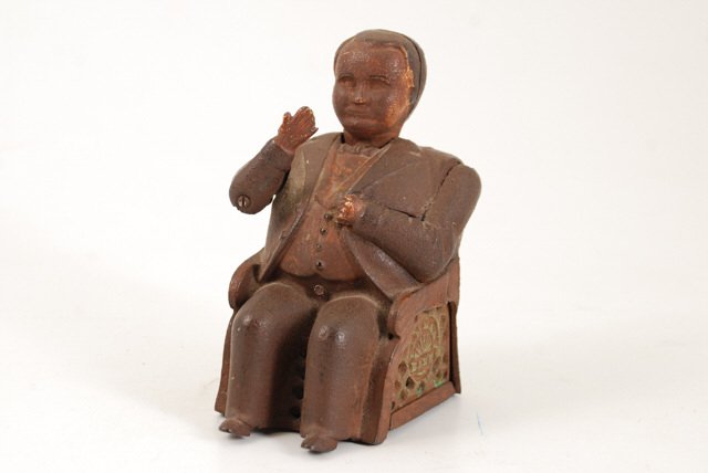 Cast Iron Tammany Hall Mechanical Bank: Height 5 1/2 inches.