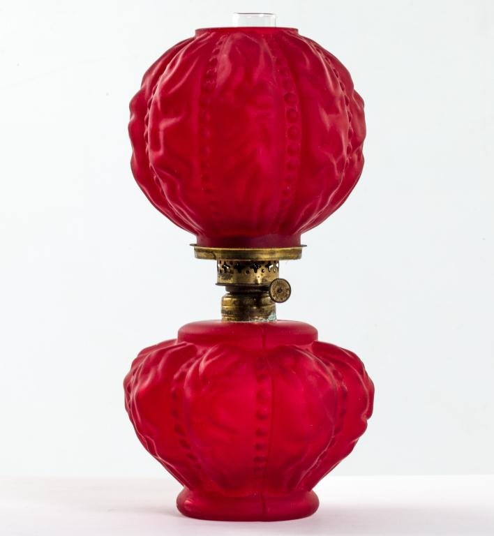 Red Satin Glass Boudoir Fluid Lamp: E. M. and Co. height 10 inches.