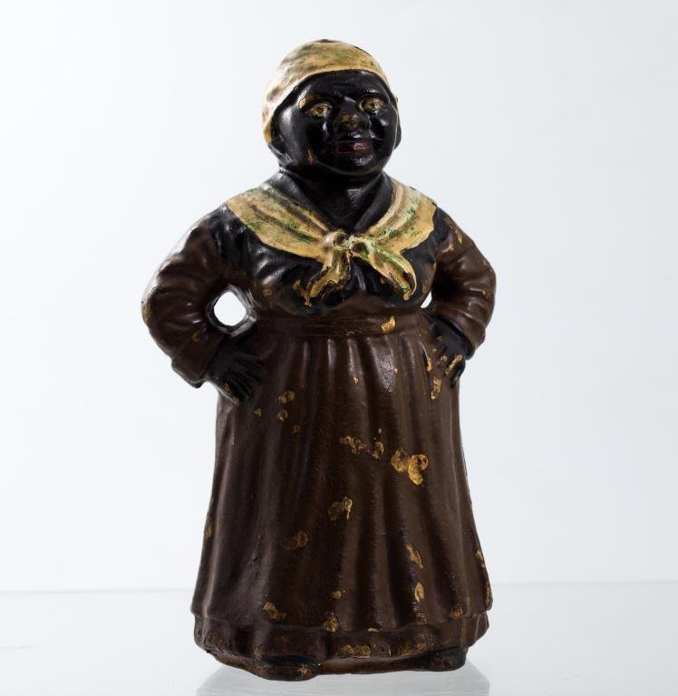 Black Americana Cast Iron Mammy Door Stop: Antique door stop. height 10 1/2 inches.